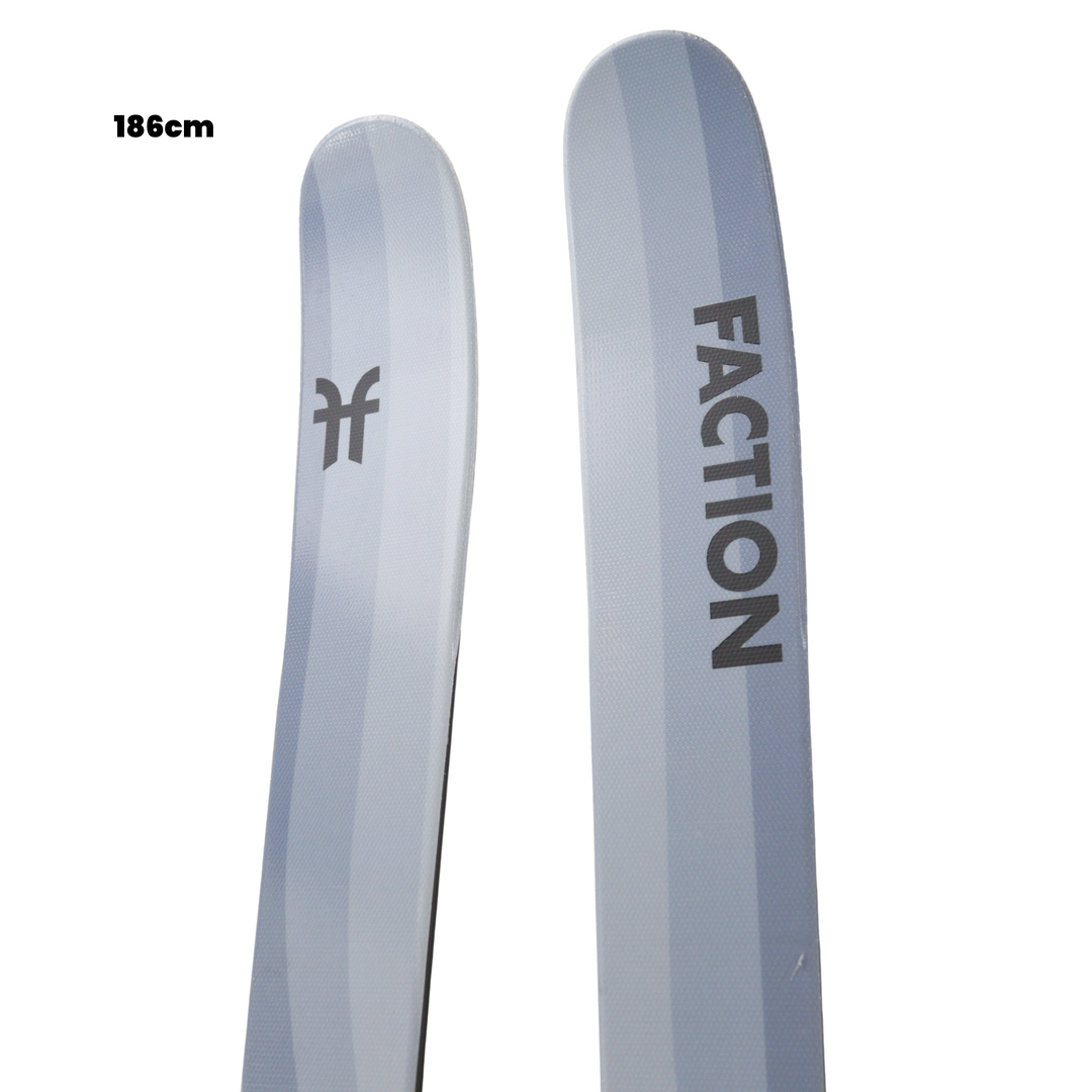 Two Faction skis with a white background