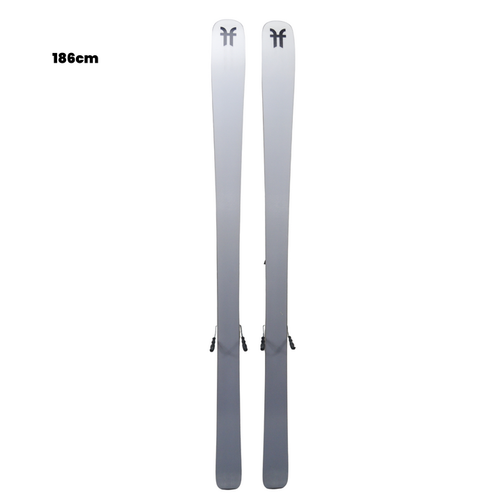 Pair of gray skis with a brand logo on a white background