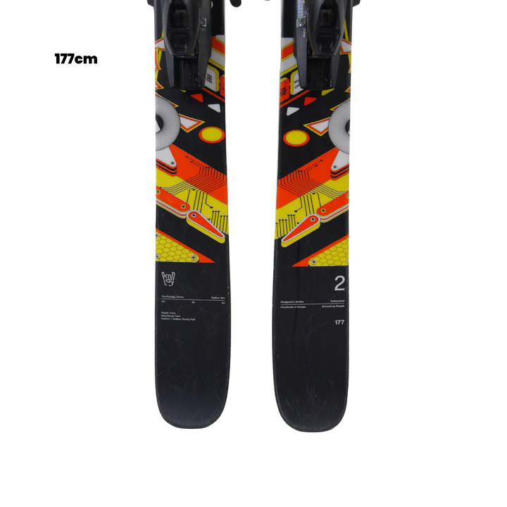 Two skis with colorful design on a white background, featuring the Utah Ski Gear logo.