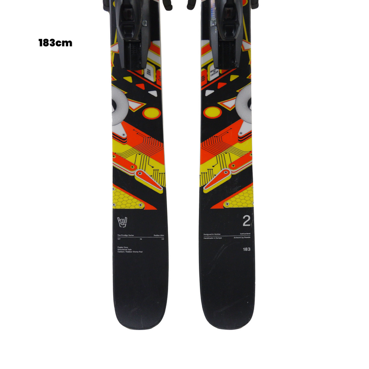 Two skis with colorful graphics and black bindings on a white background, featuring the Utah Ski Gear logo.
