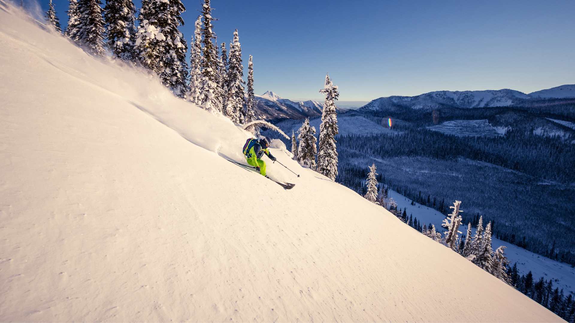 Skiing Down the mountain on fresh snow